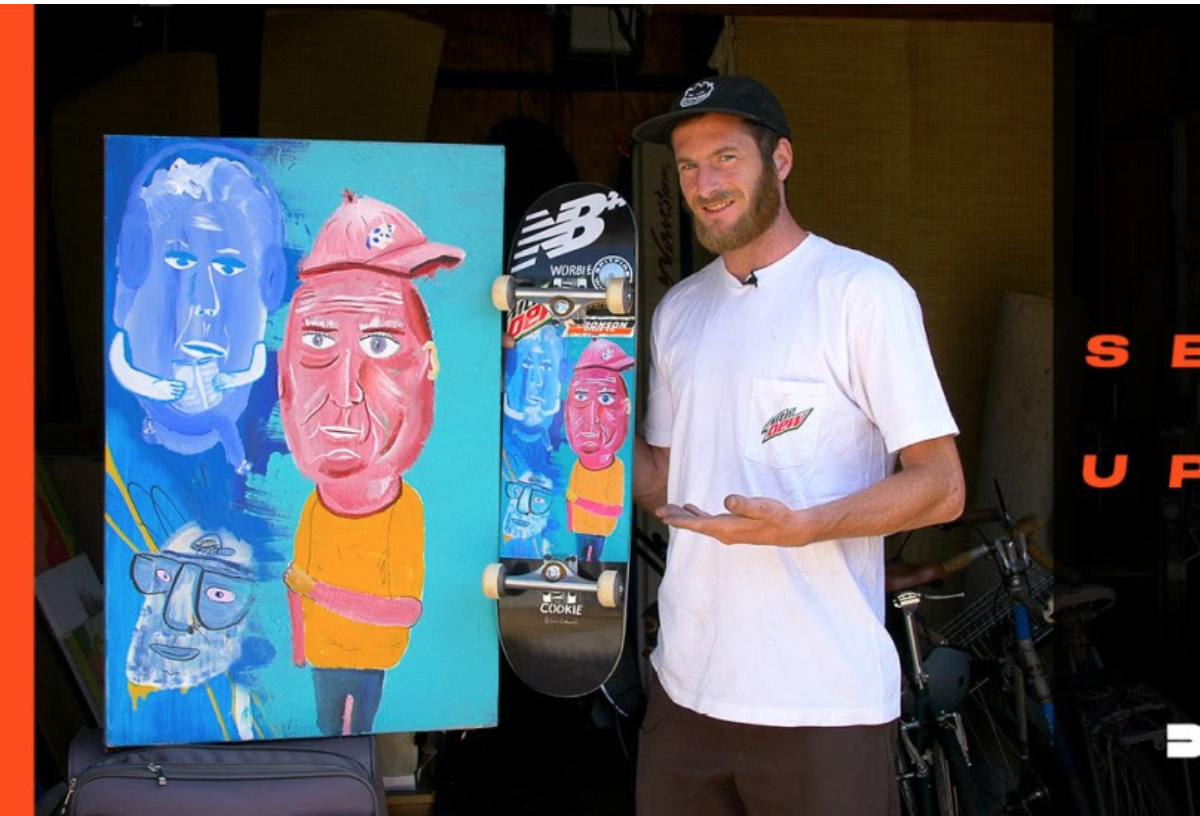 Chris Colbourn with skateboard and art