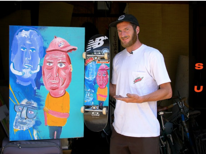 Chris Colbourn with skateboard and art